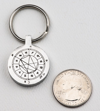 StarCharm personalized key fob compared in size to a US quarter