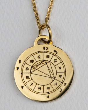 Gold-colored StarCharm personalized pendant engraved with the wearers astrological natal chart