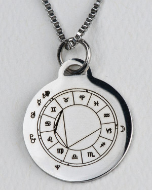 Silver-colored StarCharm pendant engraved with a natal chart